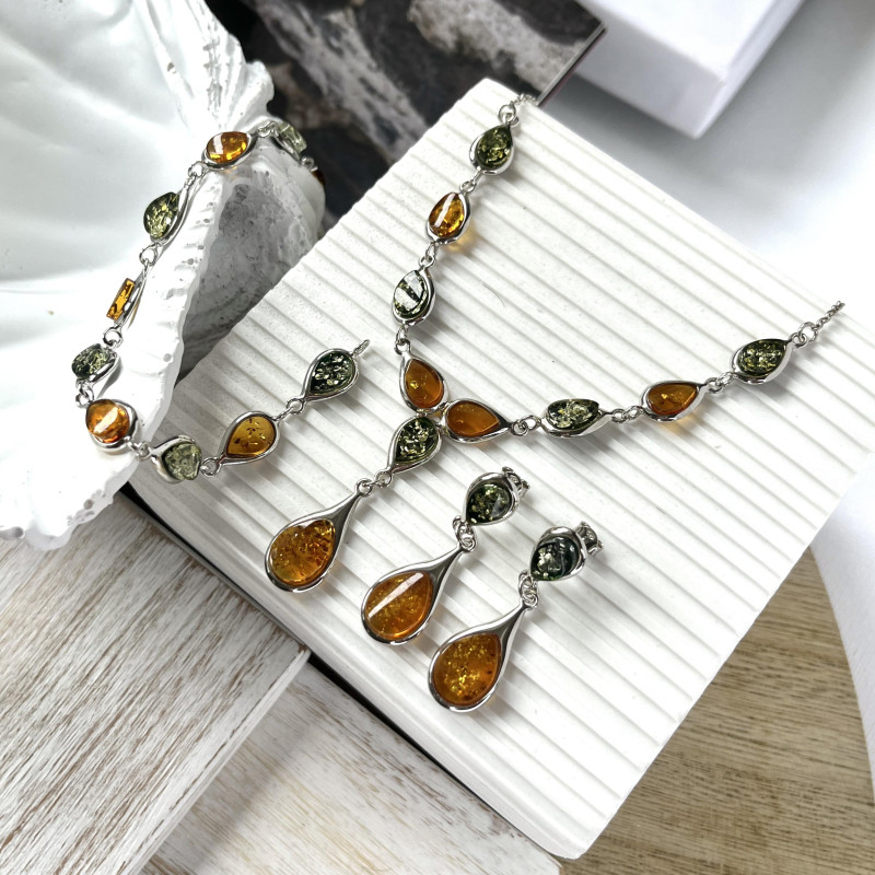 Orecchini pendenti in argento rodiato con ambra cognac, per custodire la tua luce — foto 3