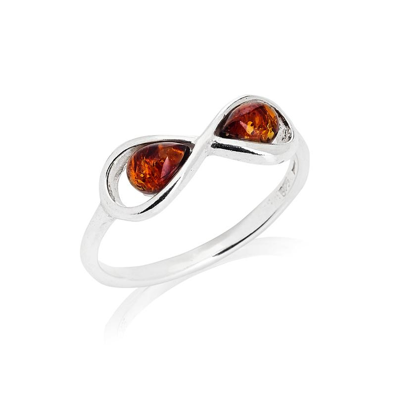 Anello multipietre e ambra cognac, per incarnare la nobiltà — foto 1