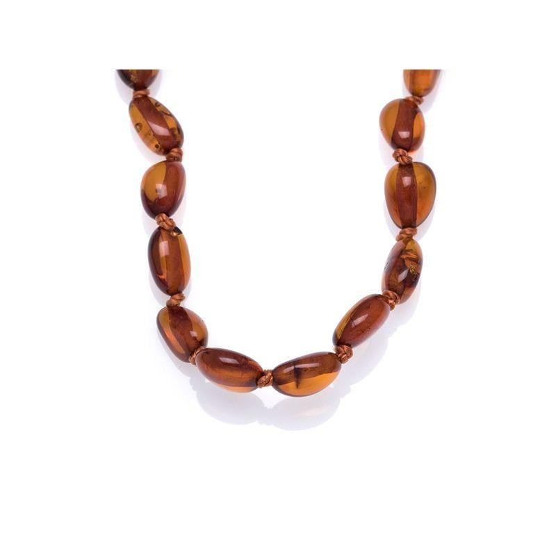 Collana per bambini in ambra cognac e oliva, chiusura a clip, per custodire il sorriso dell’infanzia