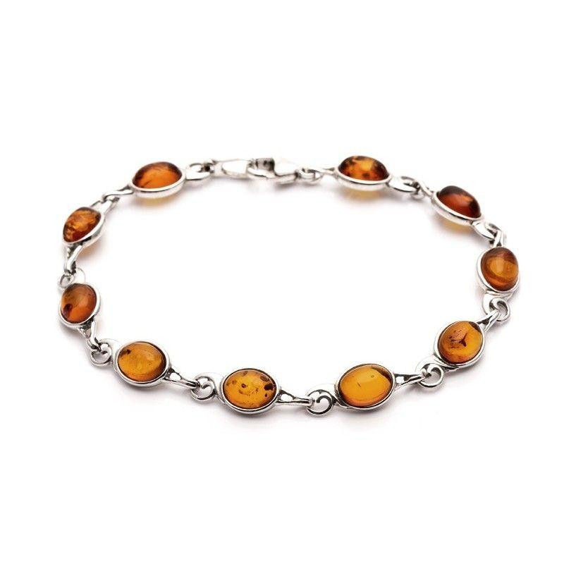 Bracciale in argento rodiato con ambra cognac ovale, per custodire la tua luce interiore — foto 1