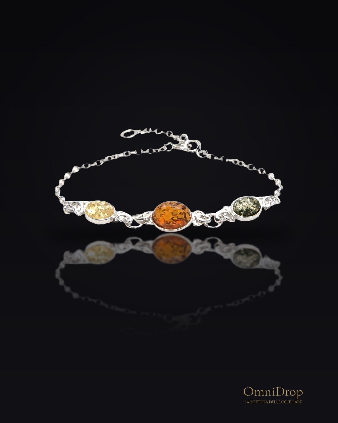 Bracciale in argento 925 rodiato con ambra ovale multicolore, per ricordare la tua luce