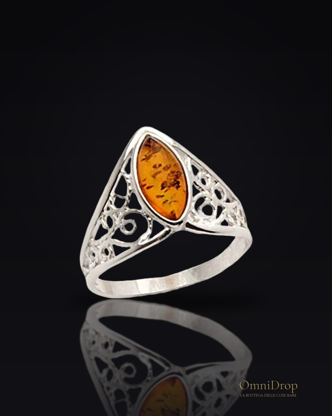 Anello ambra cognac, navetta Mar Baltico, gioiello viaggiatore