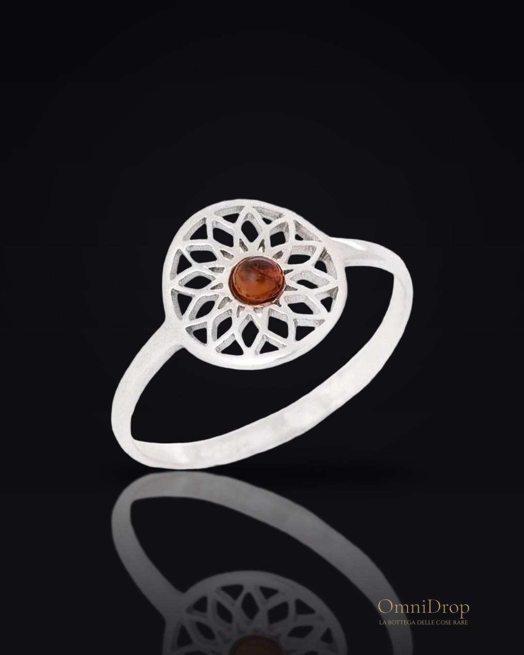 Anello fiore della vita ambra cognac, per evocare i tuoi momenti più dolci