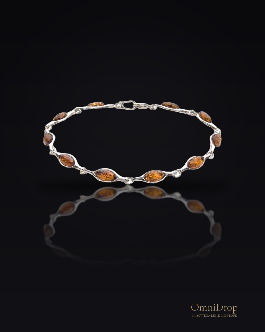 Bracciale con navetta in ambra cognac in argento 925 rodiato lunghezza 18 cm, per portare luce nei giorni