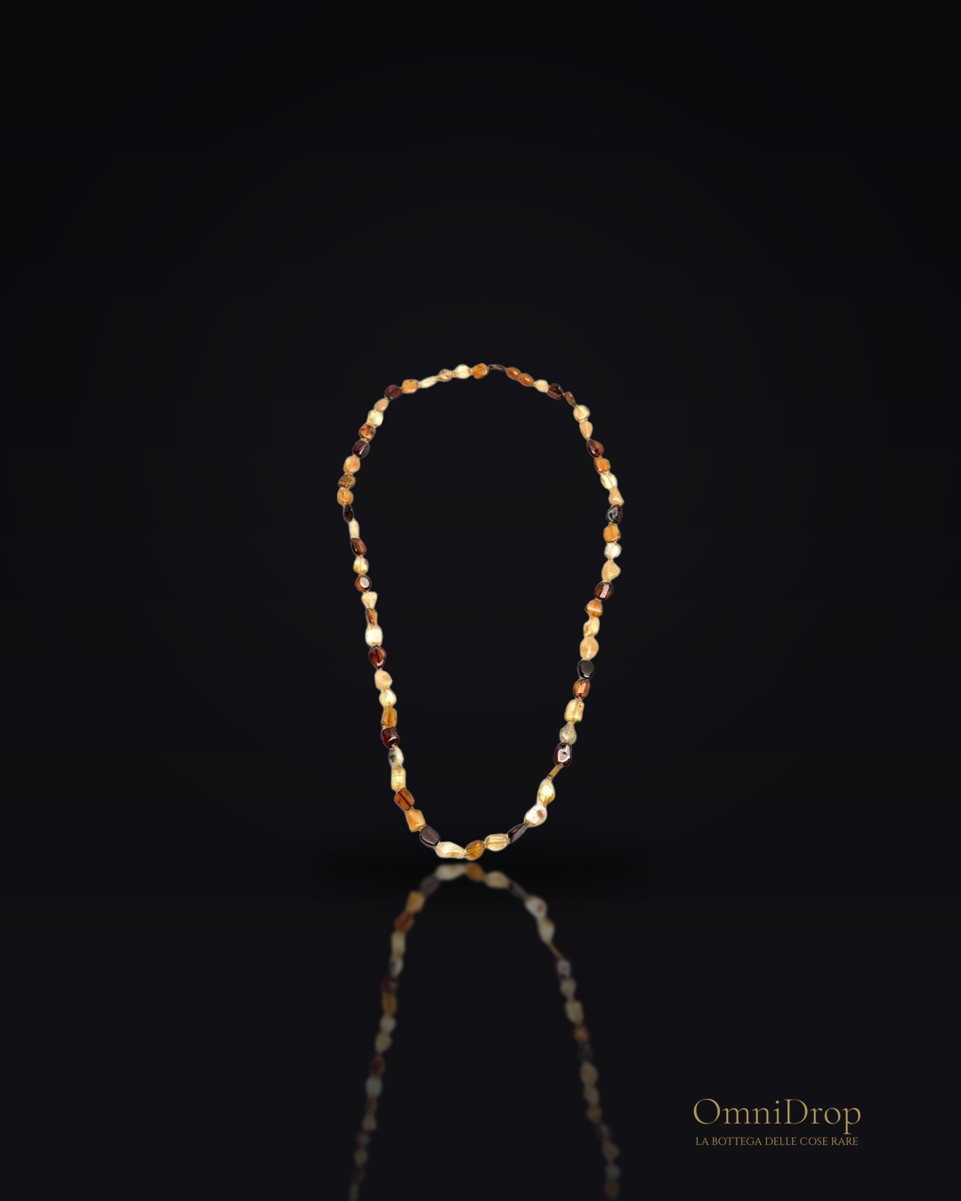 Collana ambra multicolore, per evocare i treni della memoria
