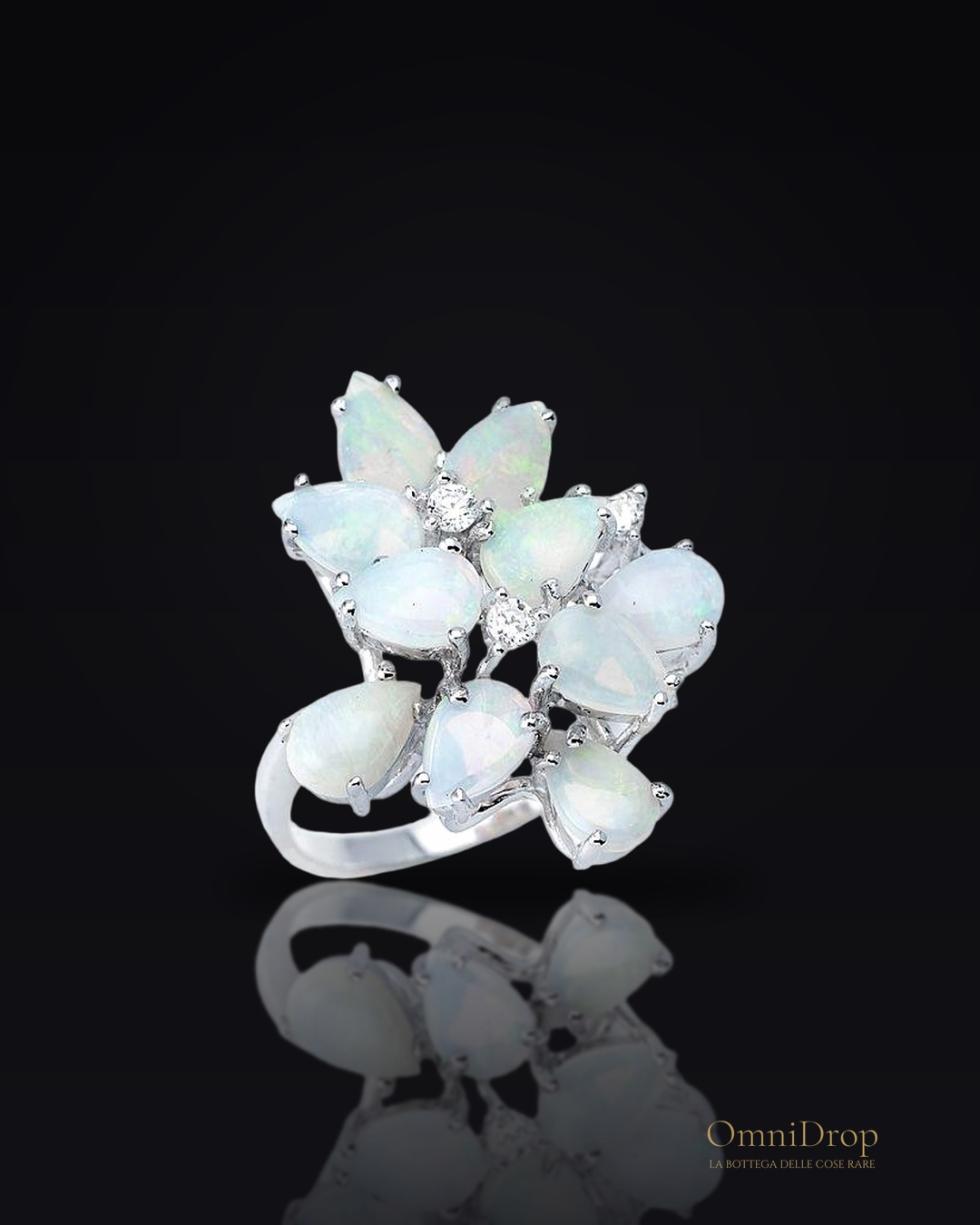 Anello opale goccia, zirconio, per evocare il dolce miele della natura