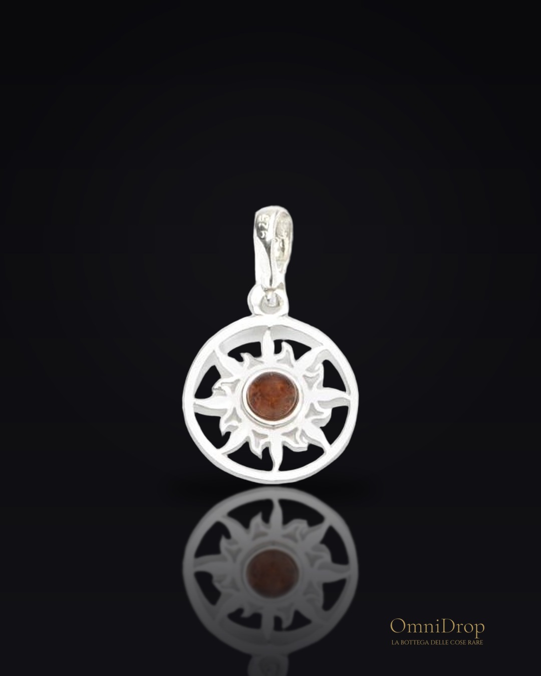 Ciondolo a sole in argento e ambra cognac, per illuminare ogni tuo giorno