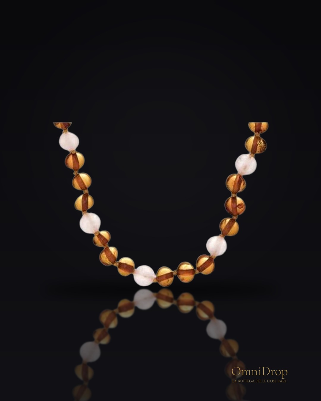 Collana ambra e quarzo rosa, per illuminare il tuo cammino