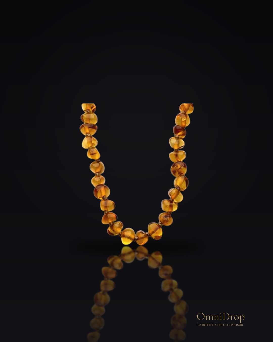 Collana in ambra connotata dal caldo colore del cognac - per evocare la dolcezza della vita