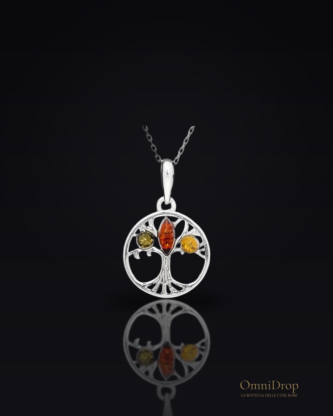 Ciondolo albero della vita in argento rodiato con ambra, per ricordare la tua luce