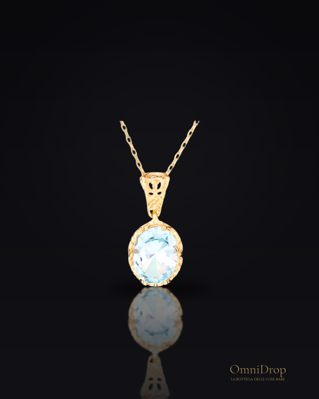 Ciondolo con topazio blu naturale, in oro 750